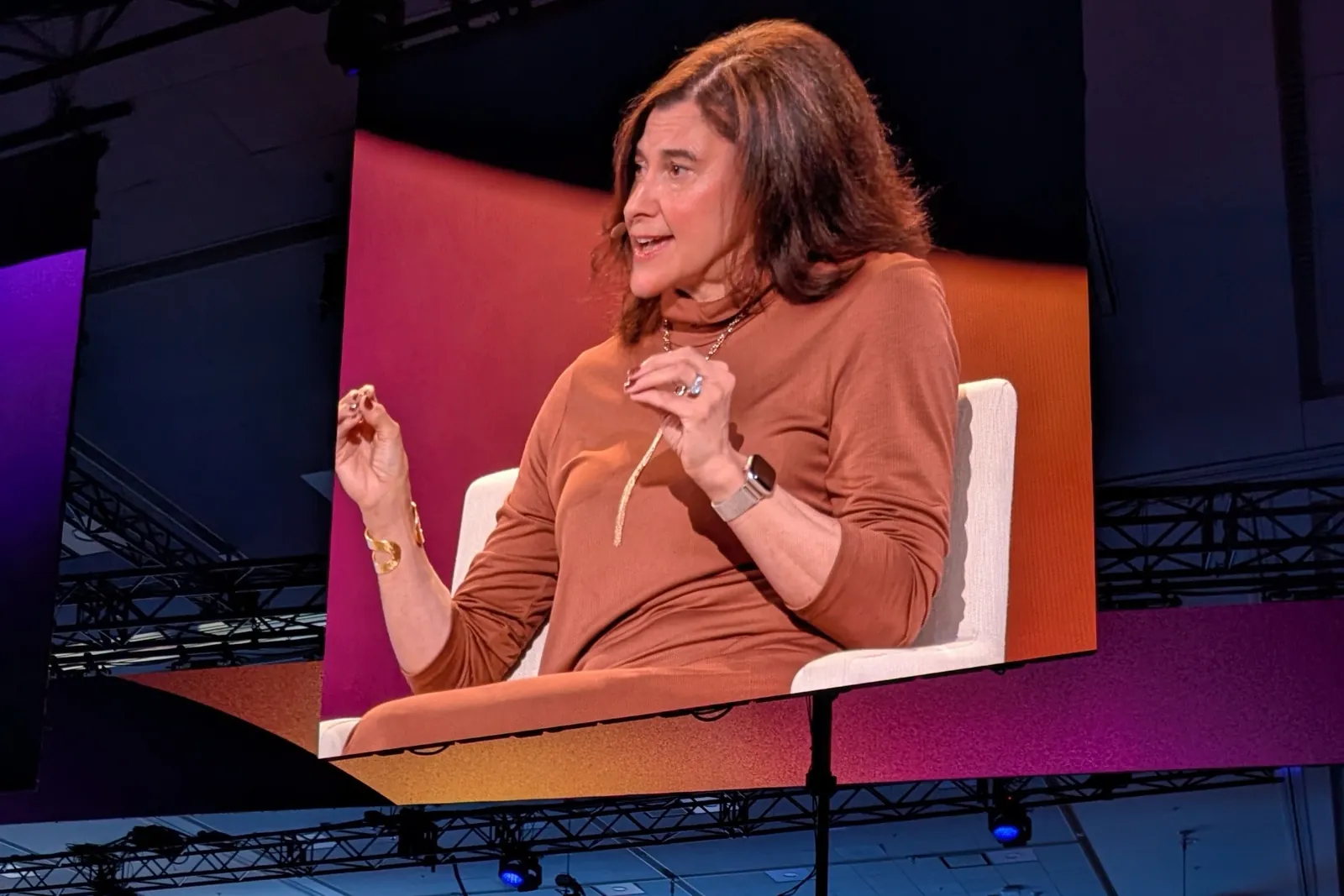 Speaker on stage at Amazon Ads unBoxed 2026, shown on the large screens above the audience